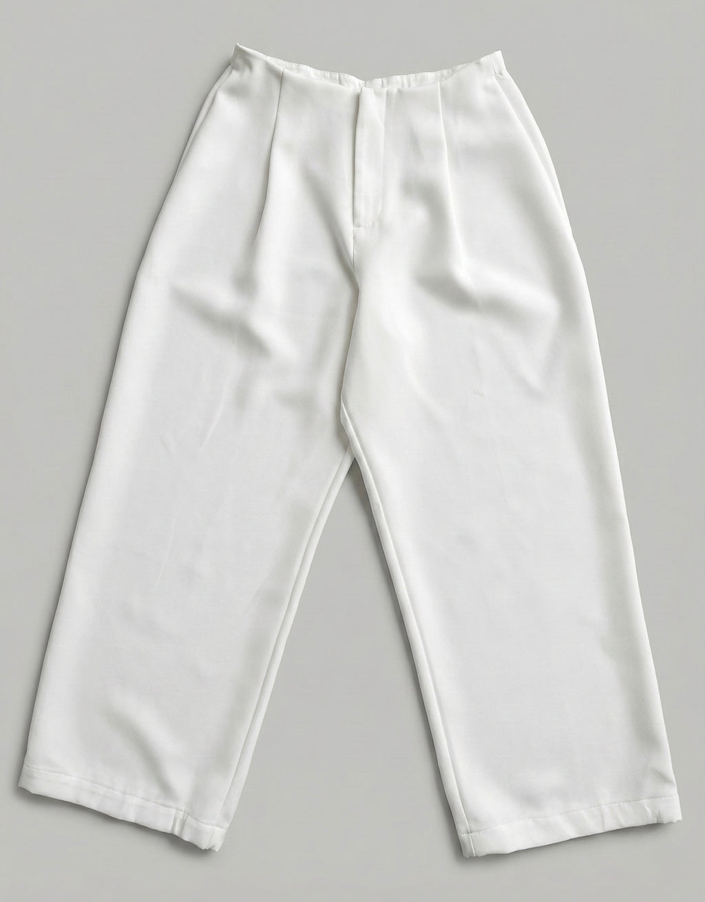 A LITTLE CAOS PANTS IN IVORY