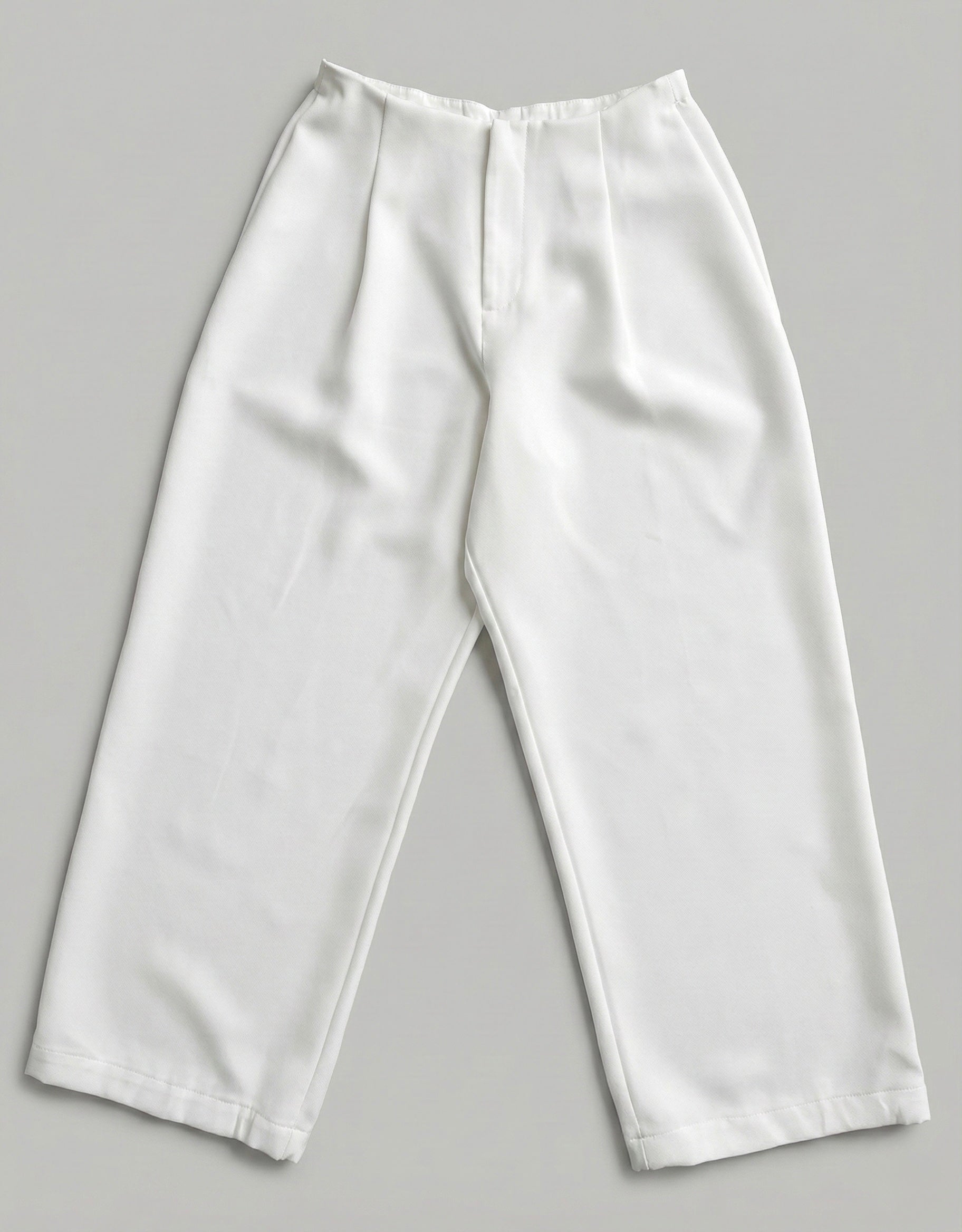 A LITTLE CAOS PANTS IN IVORY