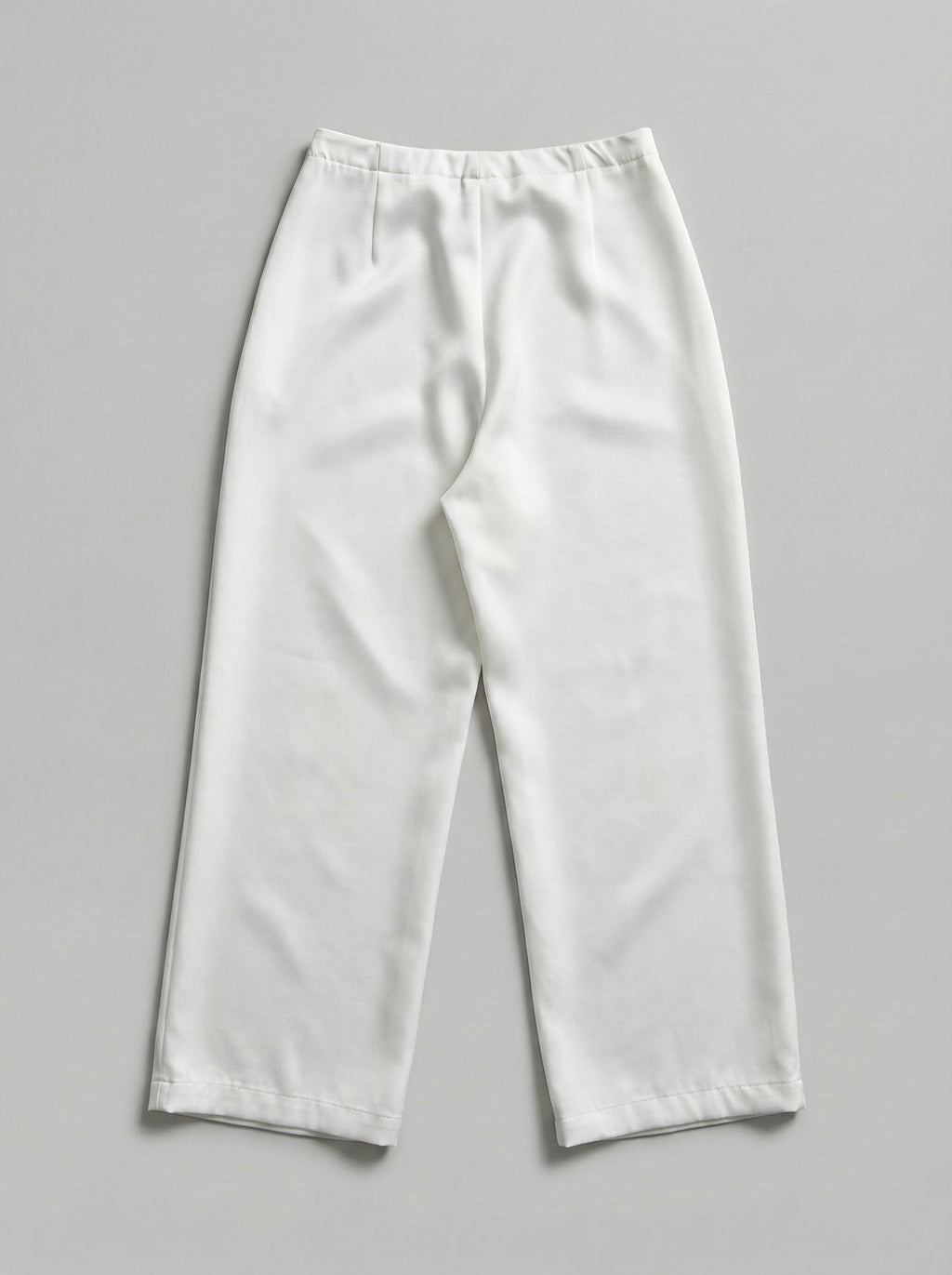 A LITTLE CAOS PANTS IN IVORY