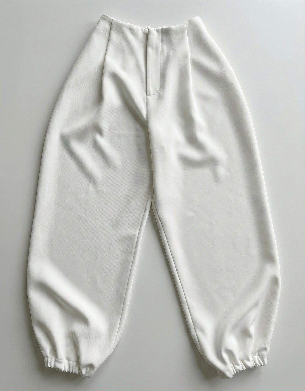 A LITTLE CAOS PANTS IN IVORY