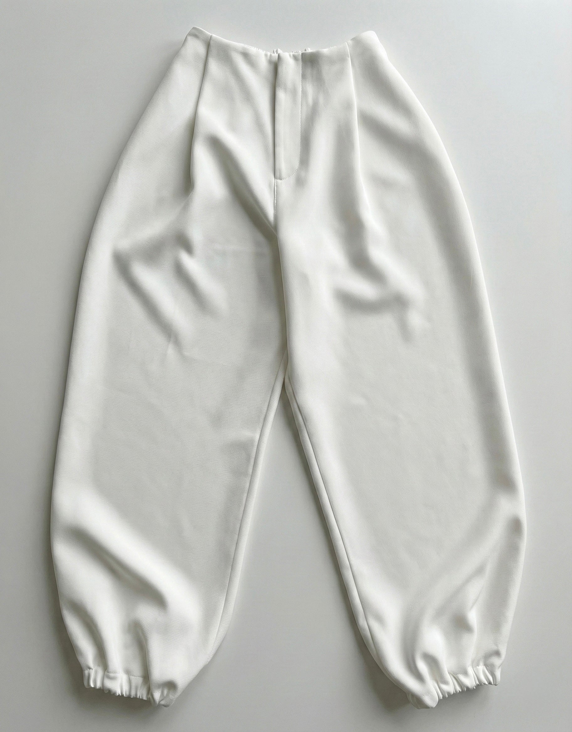 A LITTLE CAOS PANTS IN IVORY